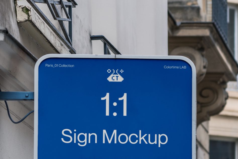 Outdoor sign mockup in urban setting for branding, graphic design display, and advertising, with clean blue backdrop and white text.